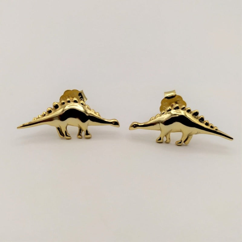 Pendientes pequeños de plata chapada en oro dinosaurio foto