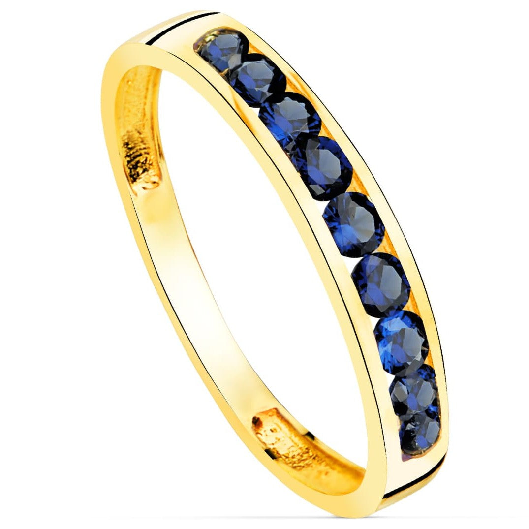 Anillo oro 18k circonitas azules ancha