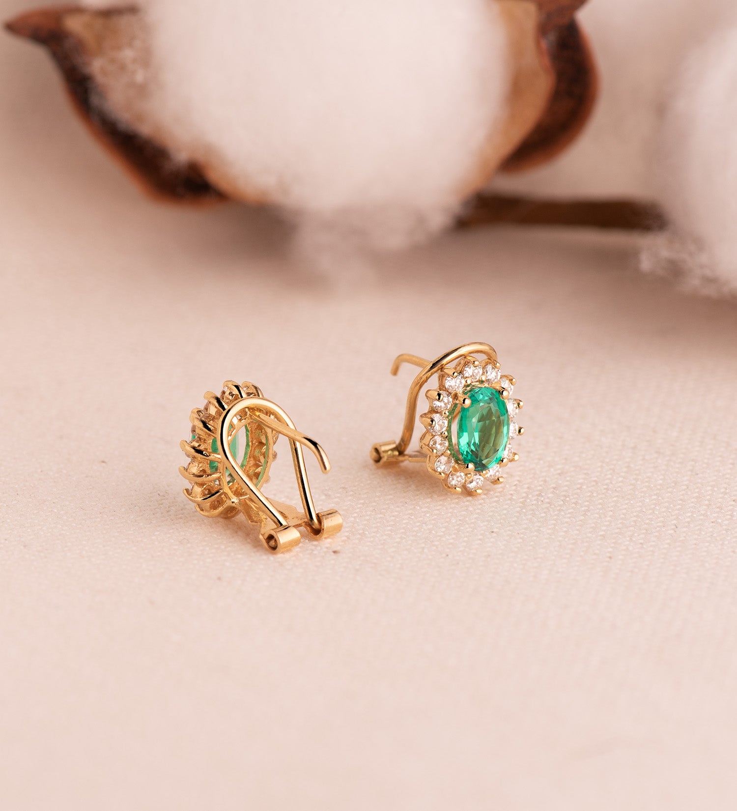 18k emerald omega diamond earrings