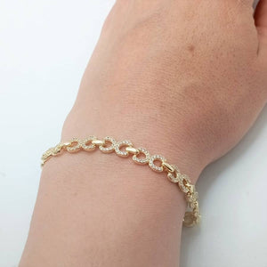 Pulsera de plata de ley 925 chapada en oro con motivos de estribos y circonitas mano