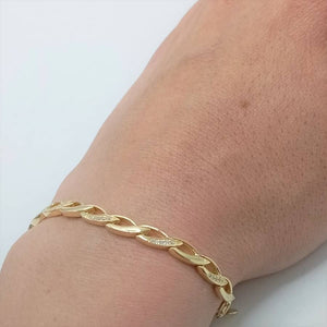 Pulsera de plata de ley 925 chapada en oro con motivos de espigas y circonitas mano