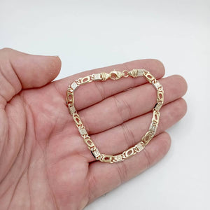 18K PULSERA ORO BICOLOR PARA CABALLERO CON DETALLE DE TORNILLO DETALLE