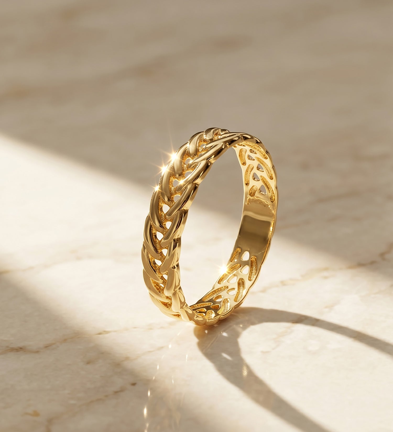 Anillo trenzado espiga oro 18k