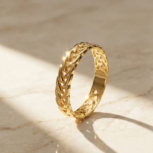 Anillo trenzado espiga oro 18k