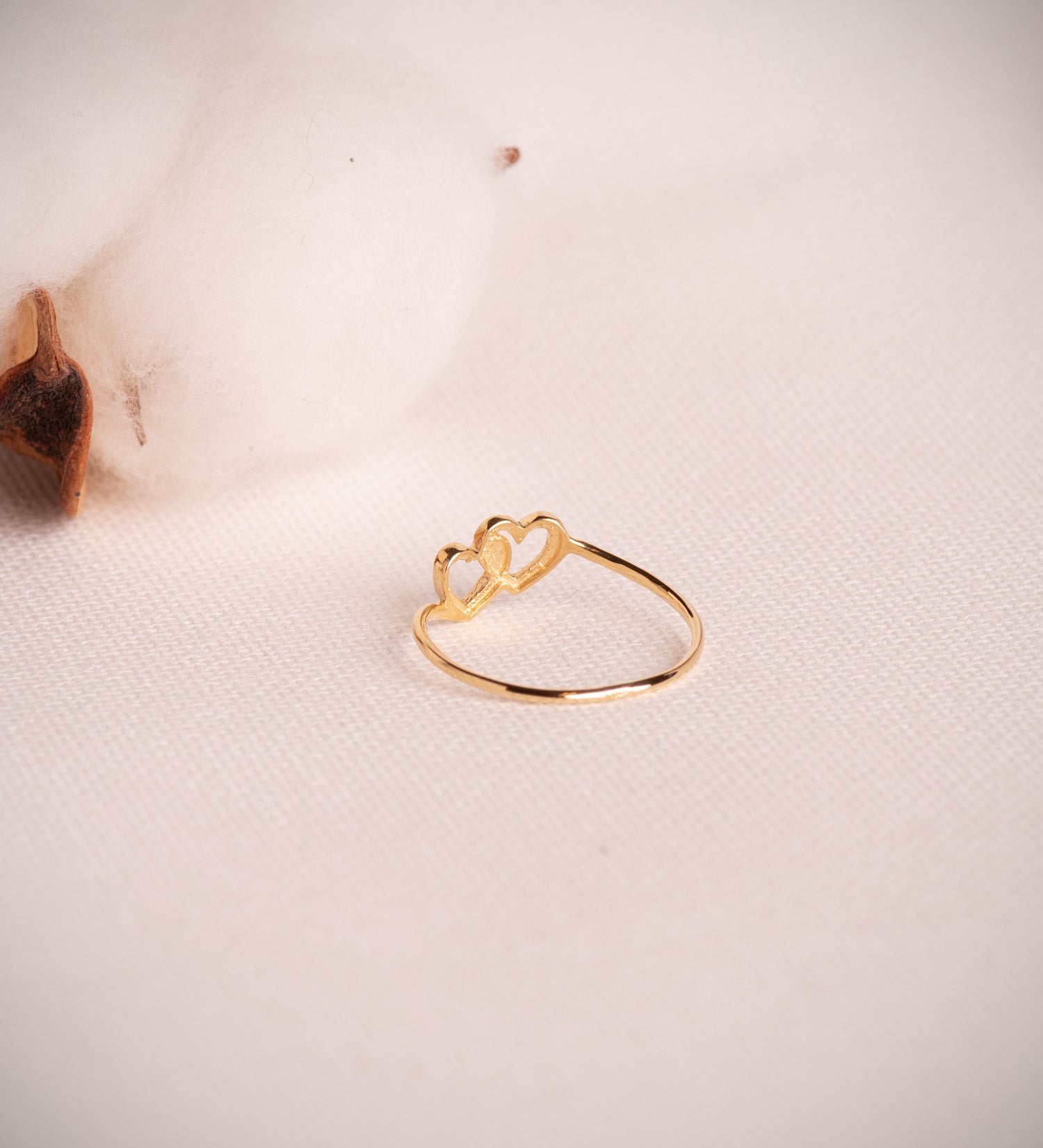 Anillo corazones entrelazados oro amarillo 18k