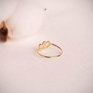 Anillo corazones entrelazados oro amarillo 18k
