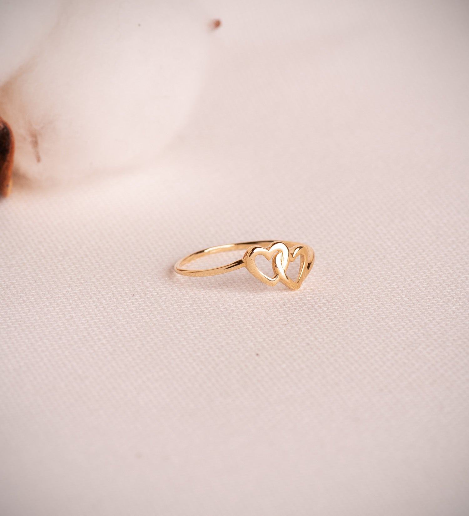 Anillo corazones entrelazados oro amarillo 18k
