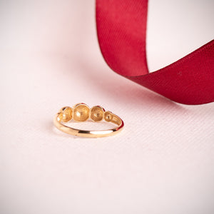 Anillo cinco bolas en disminución oro 18k