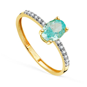 Anillo con topacio paraíba y circonitas en oro 18k bicolor