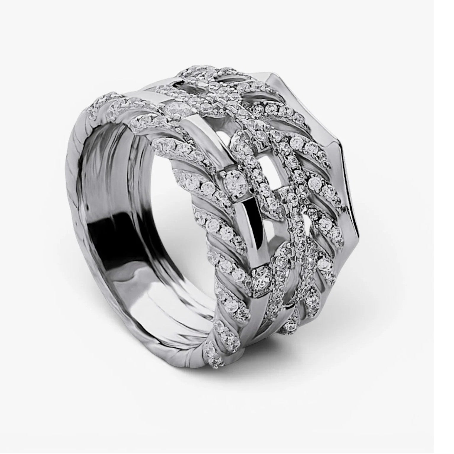 Anillo ancho de plata de ley 925 con diseño entrelazado y circonitas blancas.