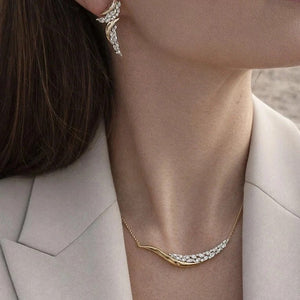 Pendientes bicolor de plata de ley 925 con baño de oro, diseño elegante y circonitas blancas, 46mm x 15,8mm x 4,6mm.