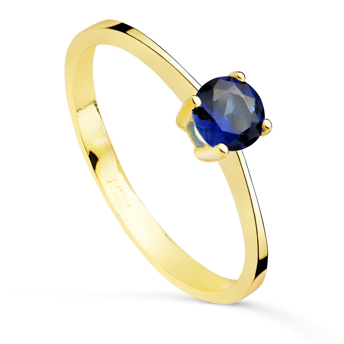 Anillo solitario con circonita azul de 4 garras en oro 18k