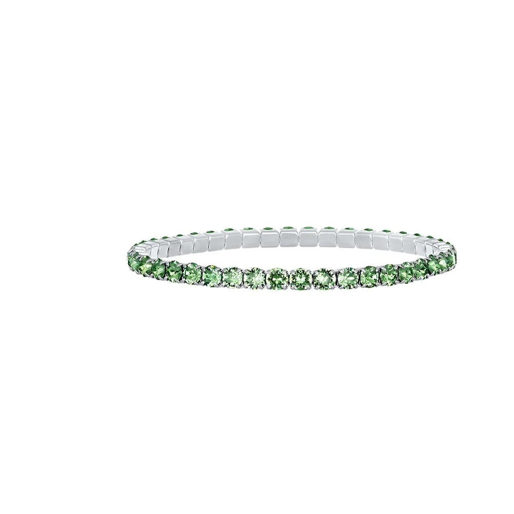 Pulsera elástica Aura de acero inoxidable de 4 mm de ancho y 18 cm de largo, de la firma Crystalp elaborada con cristales Swarovski® color peridoto