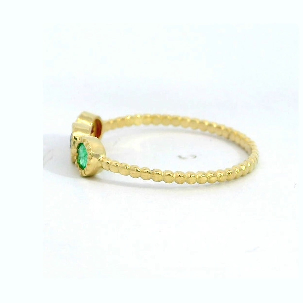 Anillo oro 18 quilates triple bocel zafiro rubí esmeralda - detalle de las piedras