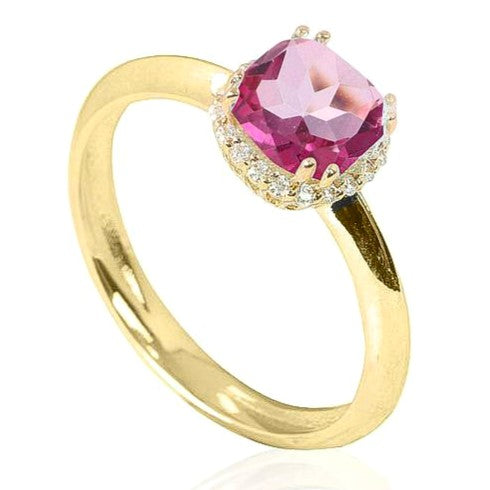 Sortija de oro amarillo de 18 k con orla de circonitas y un topacio rosa en el centro engastado en garras