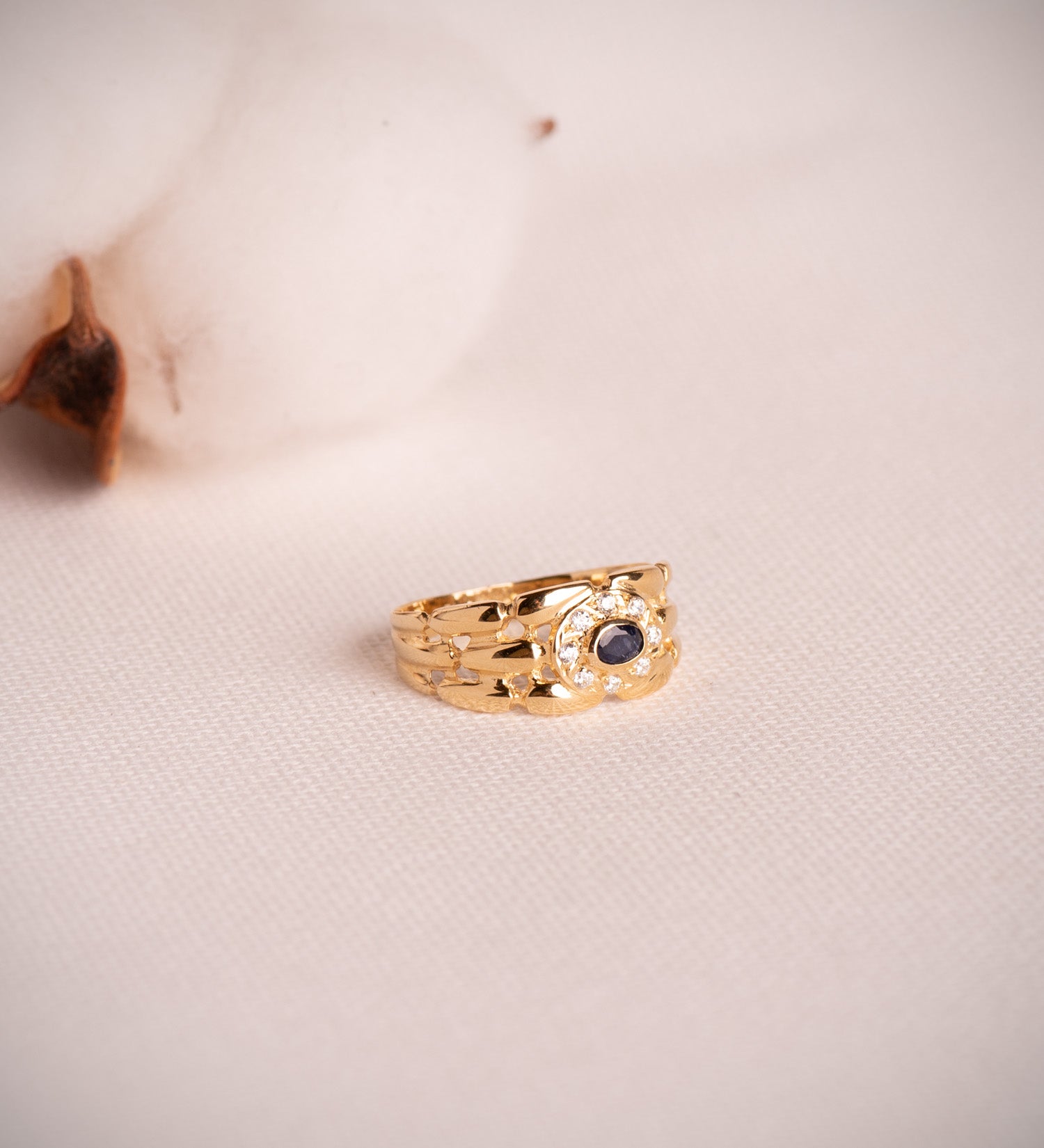 Anillo panter oro 18k con circonitas y zafiro natural