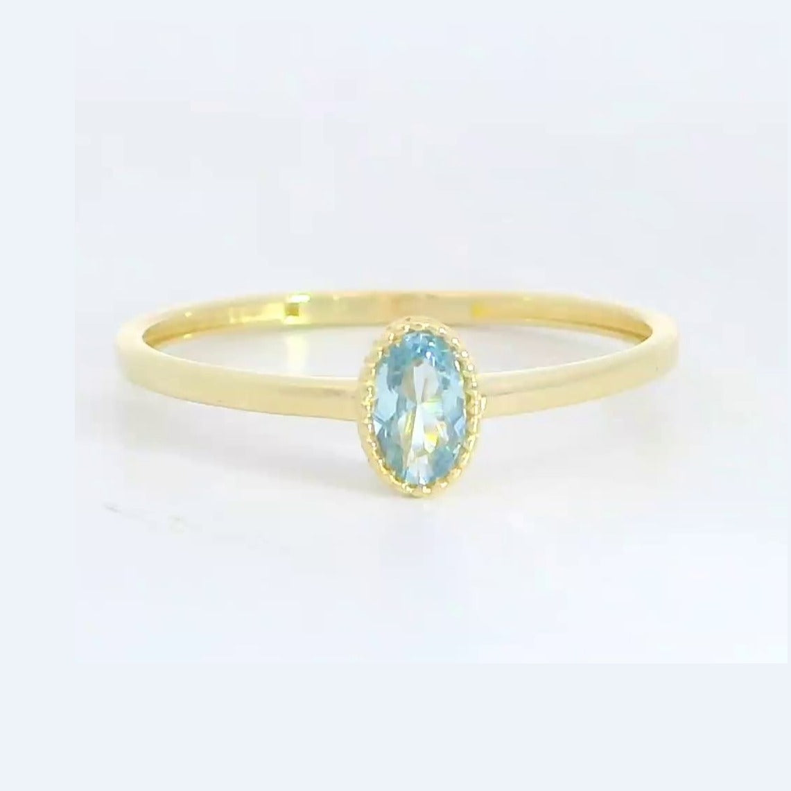 Anillo oro 9 quilates circonita oval agua marina 6x4 mm - vista lateral