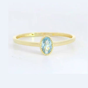 Anillo oro 9 quilates circonita oval agua marina 6x4 mm - vista lateral