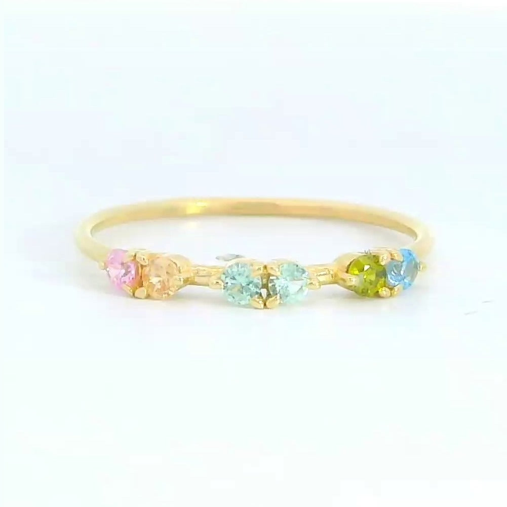 Anillo oro 9k circonitas colores pastel - detalle