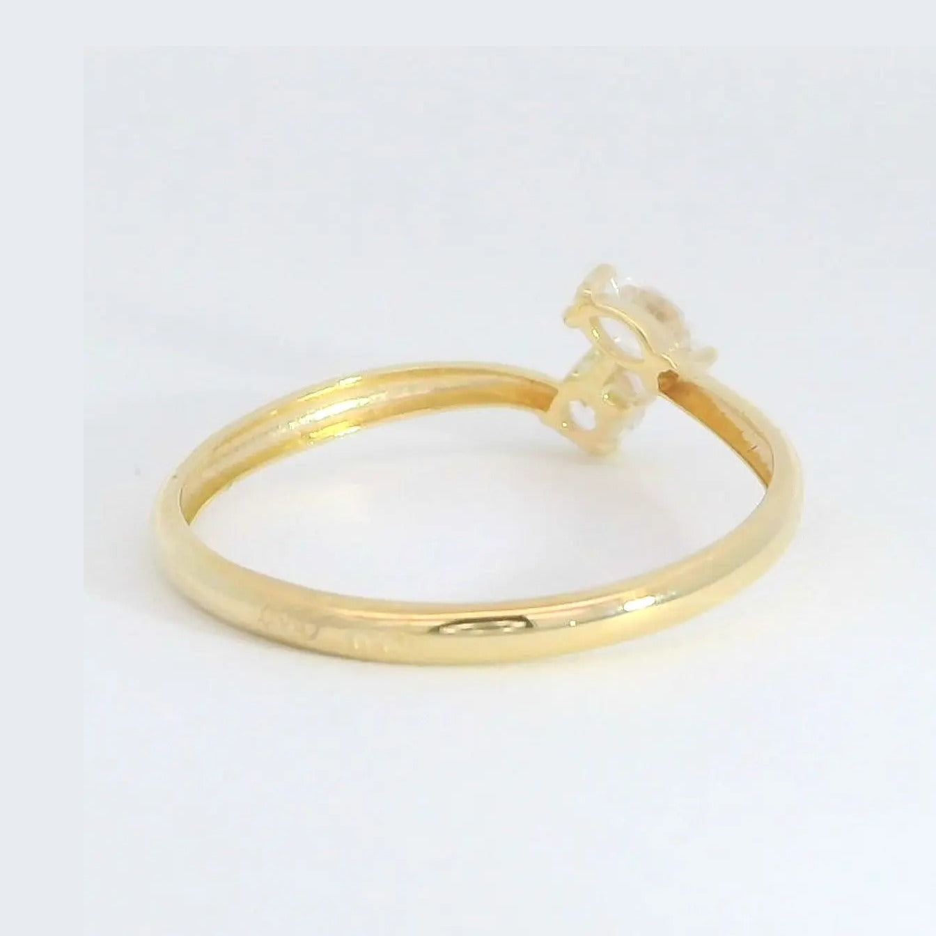 Anillo oro 9k circonitas cruzadas - vista lateral