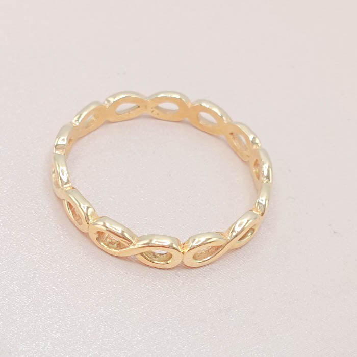 Anillo de oro 18k macizo en forma de infinitos encadenados foto