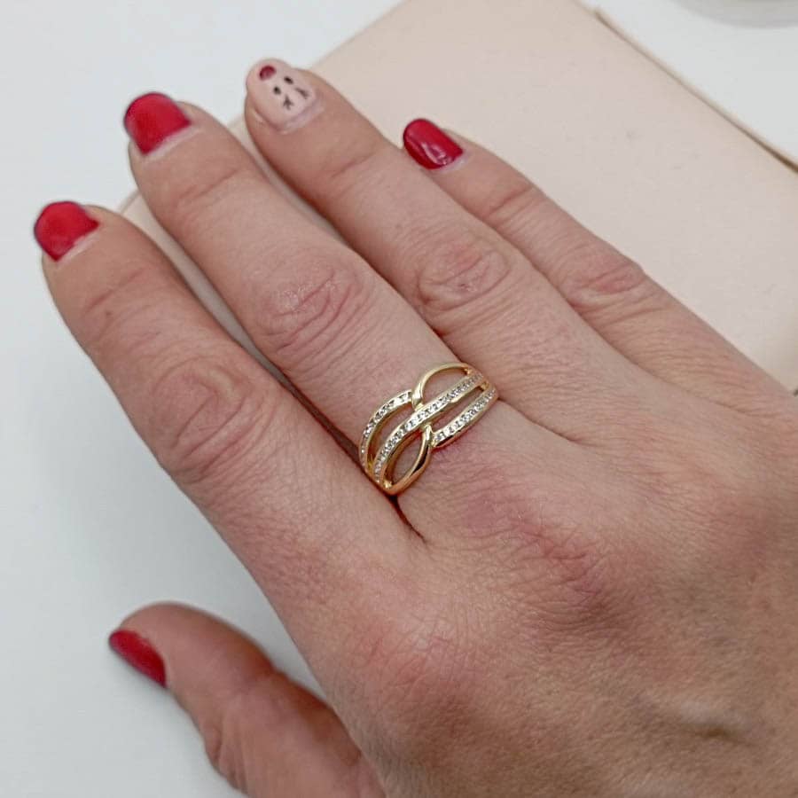 Anillo de oro 18k ancho bicolor con líneas de circonitas mano