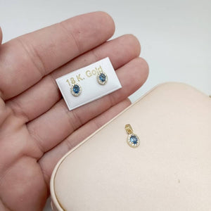 Conjunto pequeño azul de oro 18k en forma de rosetón con circonitas mano