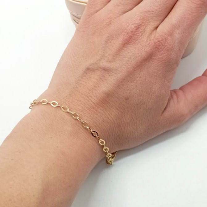 Pulsera de plata fina bañada en oro con eslabones ovalados foto
