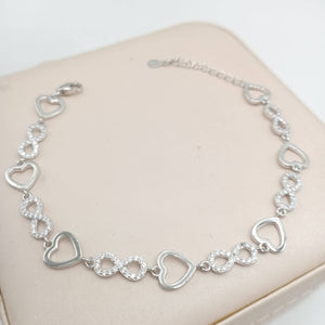 Pulsera de plata fina con figuras de infinito y corazón hd