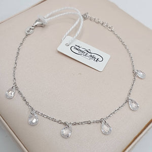 Pulsera de plata fina con circonitas blancas colgando hd