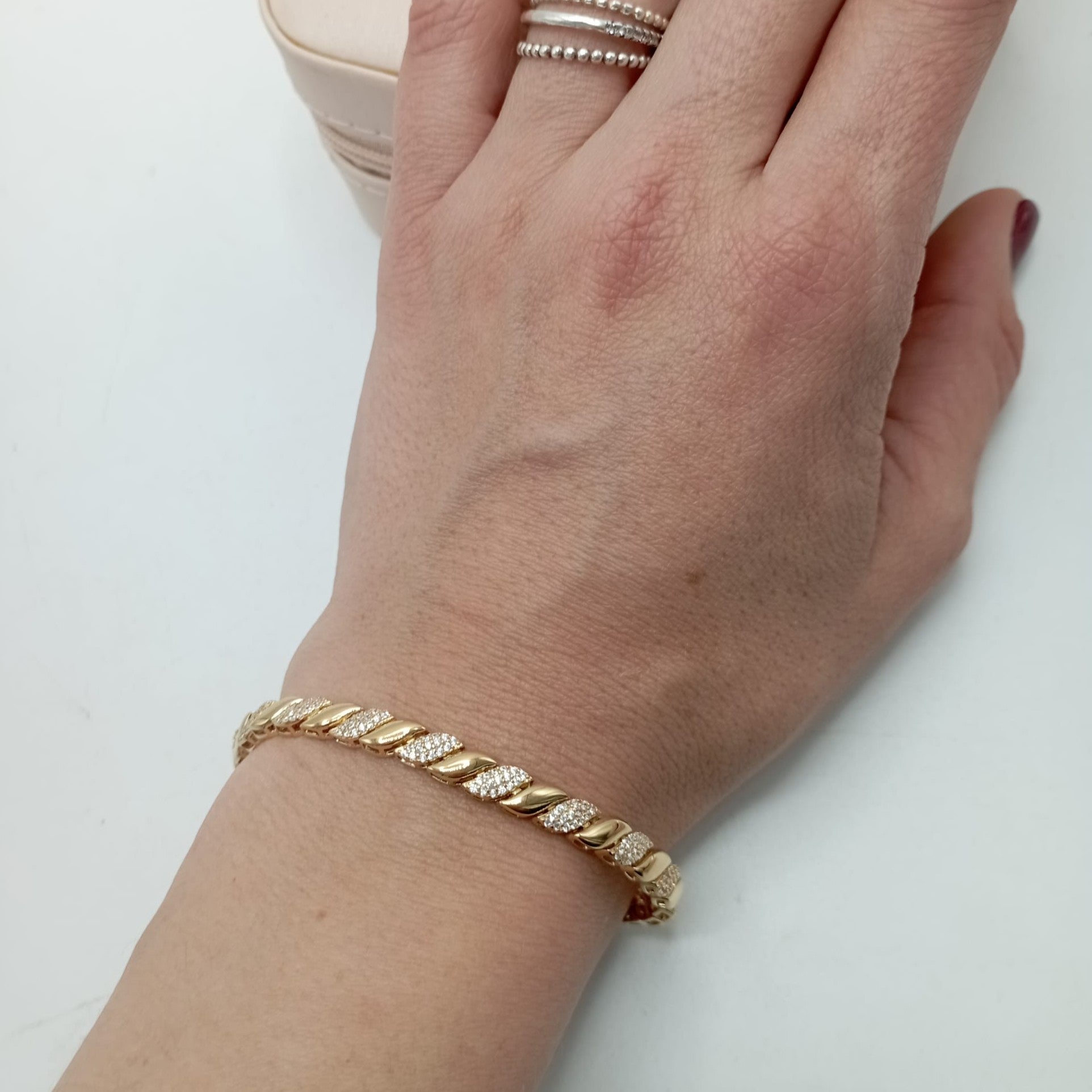 Pulsera de plata de ley 925 bañada en oro con diseño de trenza y circonitas mano