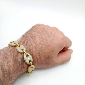 Pulsera chapada en oro calabrote de plata de ley 925 con cierre microengaste iced, mano