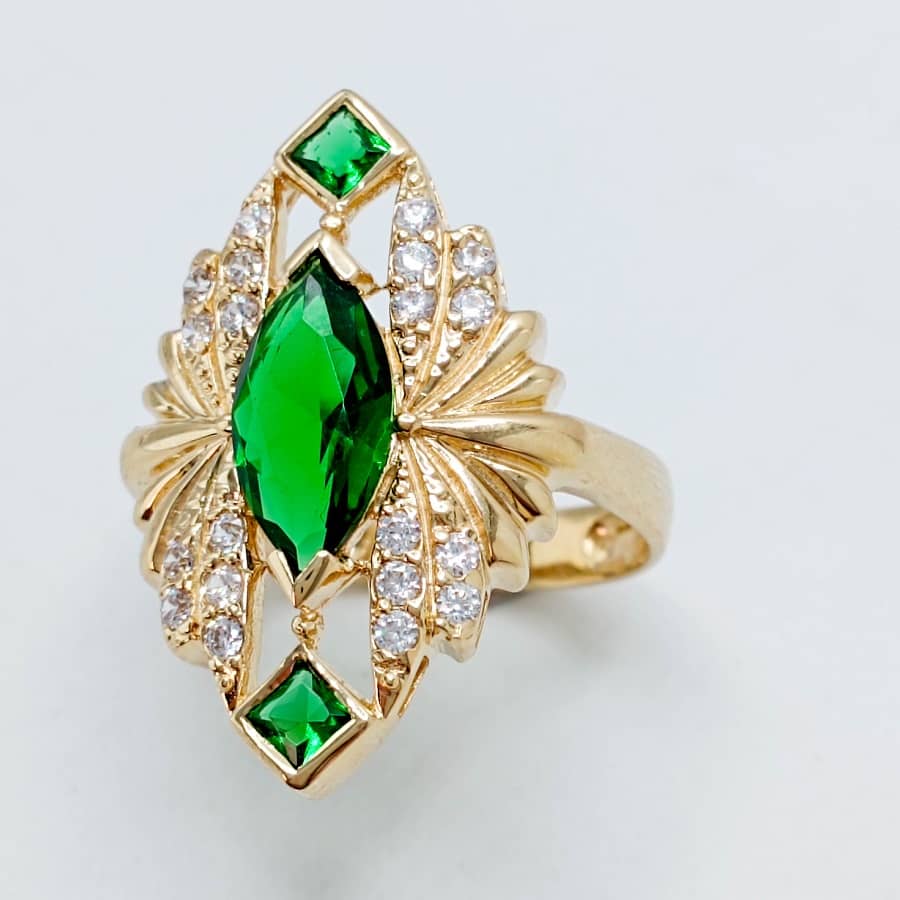 Anillo de oro 18k tipo lanzadera grande piedra verde foto