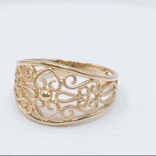 Anillo de oro 18k con dibujo calado ovalado grande gif