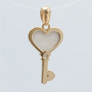 Colgante oro llave nácar gif