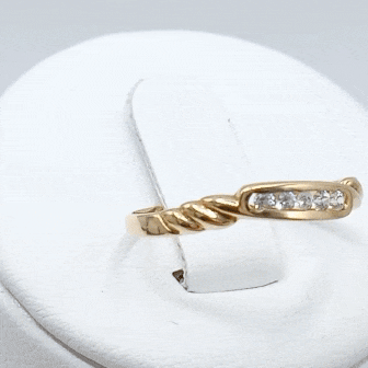 Anillo oro 18K fino chatones nudo gif