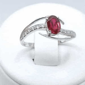 Anillo oro blanco 18k fucsia gif