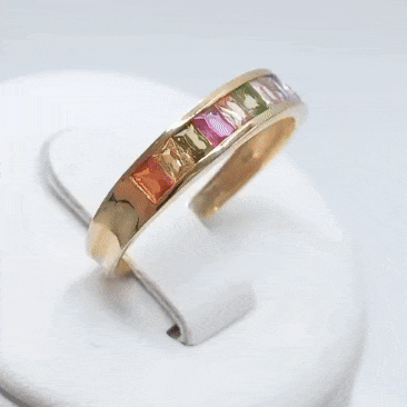 Anillo de oro 18k circonitas colores gif