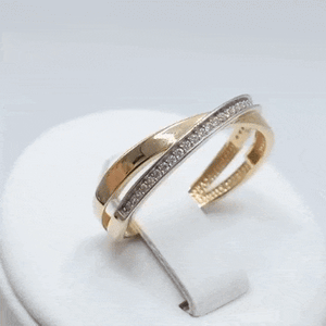 Anillo circonitas oro 18K bicolor gif
