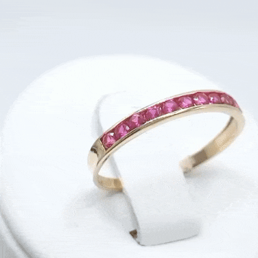 Anillo de oro 18k circonitas roja gif