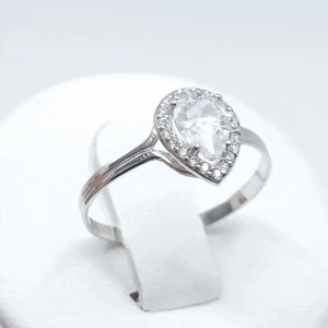 Anillo oro blanco lágrima gif