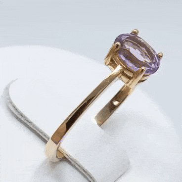 Anillo oro garras piedra amatista gif
