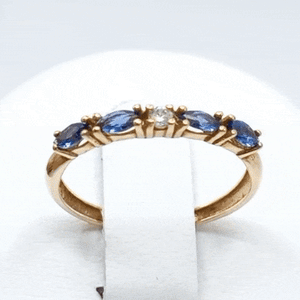 Anillo oro 18k circonitas azul 2mm gif
