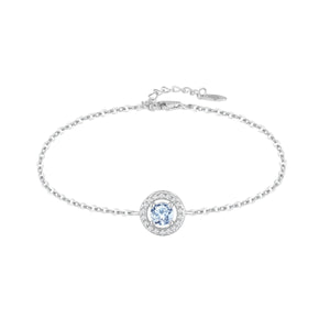 Pulsera de plata de ley 925 con circonita redonda color aguamarina orlada de blancas