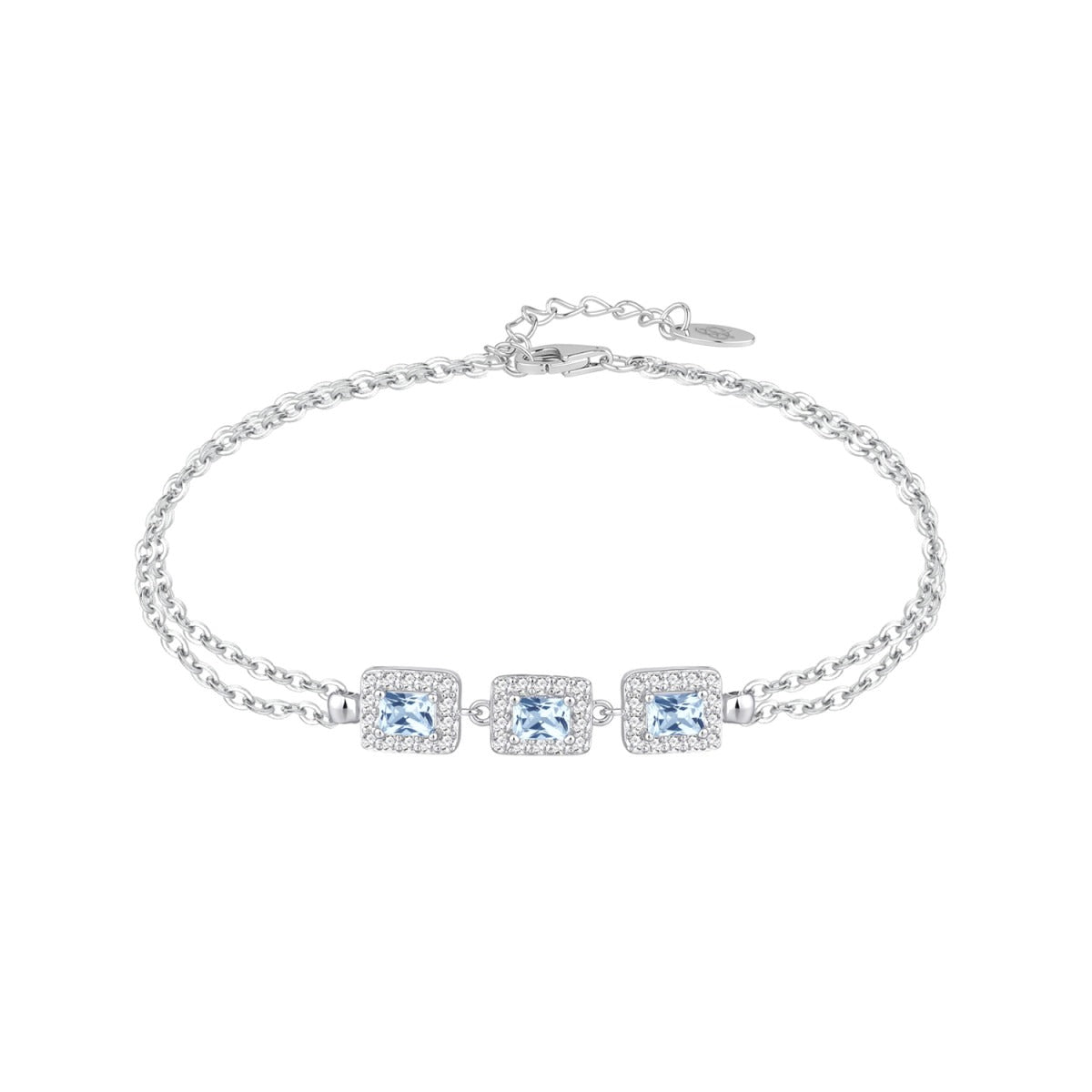 Pulsera de plata de ley 925 con tres circonitas color aguamarina y orla de blancas
