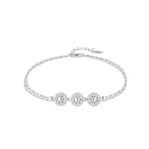 Pulsera de plata de ley con tres flores de circonitas