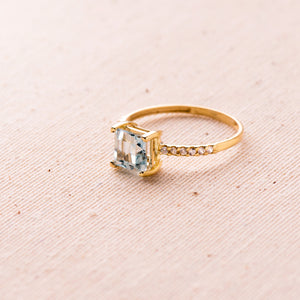 Anillo oro 18k con circonita y topacio azul