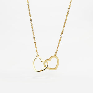 Cadena de plata de ley 925 bañada en oro 18k con dos corazones entrelazados