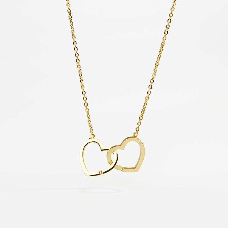 Cadena de plata de ley 925 bañada en oro 18k con dos corazones entrelazados
