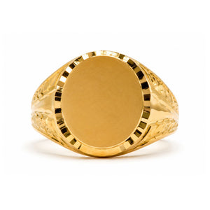Sello ovalado macizo de oro 18k con rombos: vista de la cabeza y el diseño del anillo